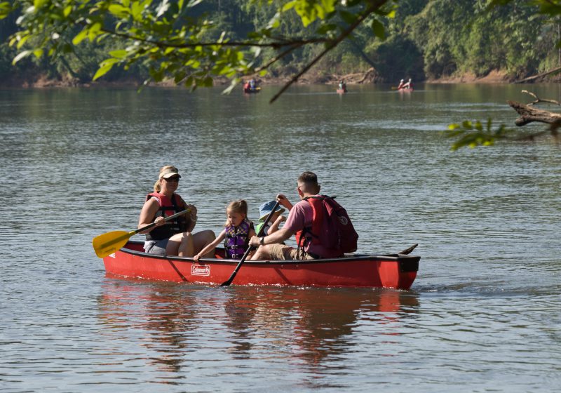A family in a canoe.