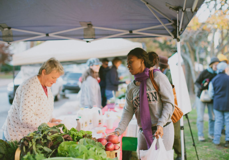 A young woman shops at a farmers market in Macon, Georgia.